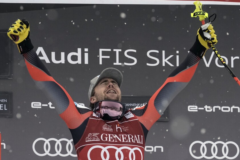 Norway's Aleksander Aamodt Kilde celebrates after winning an alpine ski, men's World Cup downhill, in Kitzbuehel, Austria, Friday, Jan. 21, 2022. (AP Photo/Giovanni Auletta)
