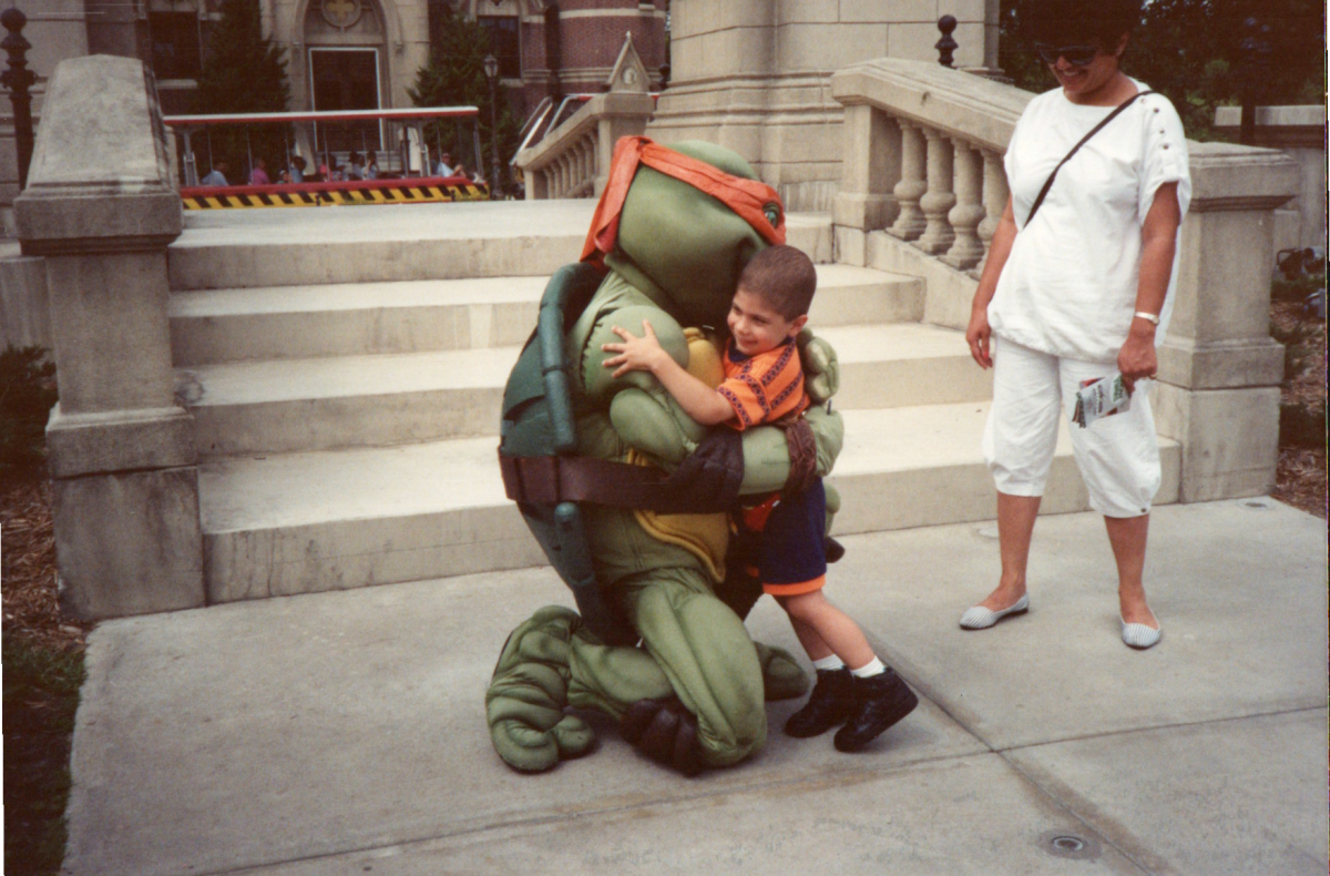 Bob Shahmardi, then just 4, hugs a character actor at Disney World.