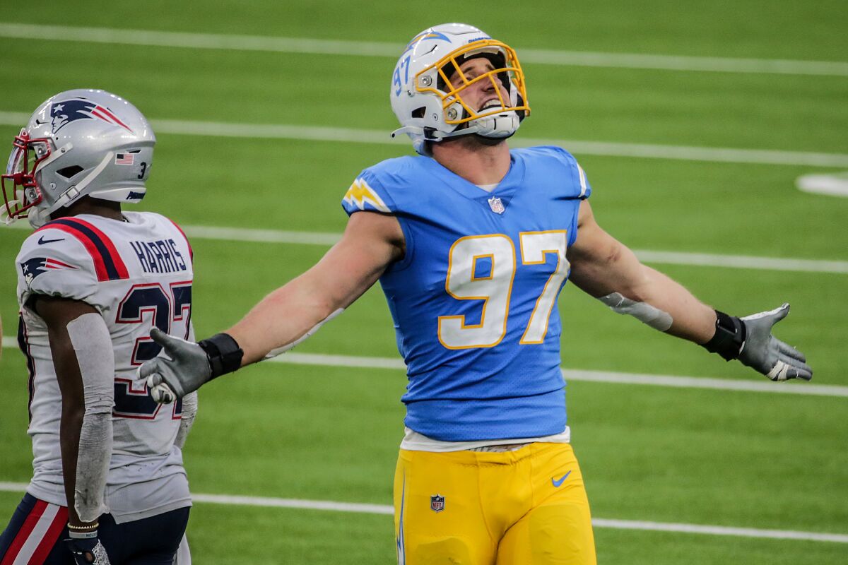 Chargers defensive end Joey Bosa looks to the sky in frustration after being flagged for roughing the passer.
