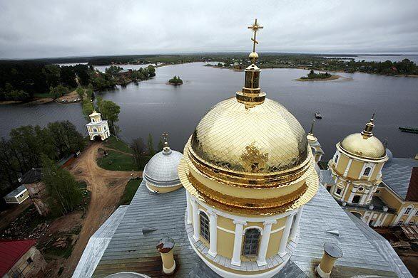 A view from the bell tower of the Nilova Pustyn monastery, 250 miles northwest of Moscow. The monastery was used as a prison camp where Polish military officers, police, gendarmes and landlords were kept after the Soviet Union invaded eastern Poland in September 1939. In April and May of 1940, the 6,295 captives were taken to the town of Kalinin, now Tver, about 100 miles from Moscow, where they were executed in the basement of the headquarters of the dreaded NKVD and then secretly buried 20 miles away in Mednoye. 1940 massacre of Poles remains potent issue