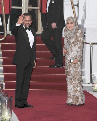 Brunei's Sultan Hassanal Bolkiah and wife Raja Isteri