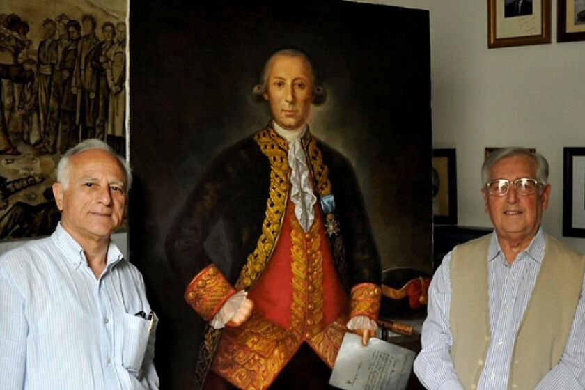Portrait of Bernardo de Galvez. At left is Manuel Olmedo Checa, vice president of the Bernardo de Galvez Assn. At right is the artist of the portrait, Carlos Monserrate.