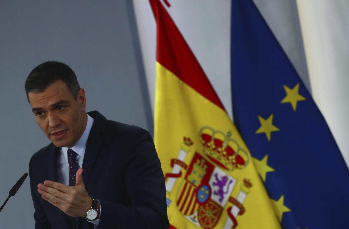 Spain's Prime Minister Pedro Sanchez talks during a press conference at the Moncloa Palace in Madrid, Spain, Tuesday, April 13, 2021. (Sergio Perez/Pool photo via AP)
