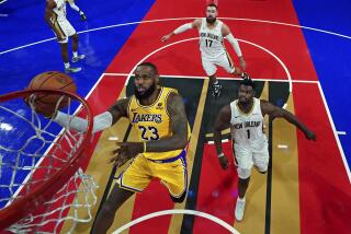 Los Angeles Lakers forward LeBron James (23) shoots the ball against New Orleans Pelicans forward Zion Williamson (1) during a semifinal game in the NBA basketball In-Season Tournament, Thursday, Dec. 7, 2023, in Las Vegas. (Kyle Terada/Pool Photo via AP)