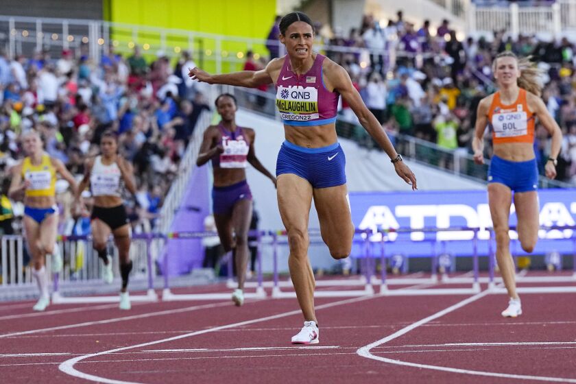 FILE - Sydney McLaughlin, of the United States, wins the final of the women's 400-meter hurdles at the World Athletics Championships on July 22, 2022, in Eugene, Ore. World-record setters McLaughlin-Levrone and Armand "Mondo" Duplantis were named World Athletes of the Year on by track's international governing body Monday, Dec. 5, adding yet another achievement to a remarkable 2022 for both athletes. (AP Photo/Ashley Landis, File)