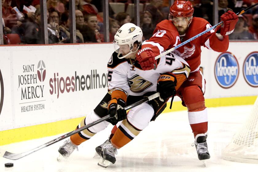Ducks defenseman Sami Vatanen beats Red Wings left wing Henrik Zetterberg to the puck during a 3-2 victory in Detroit.
