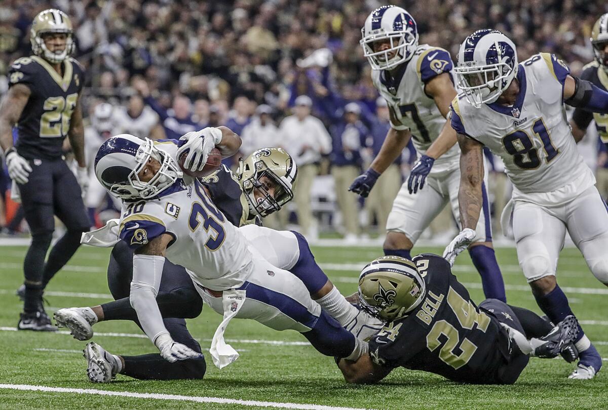 Rams running back Todd Gurley falls into the end zone for a touchdown late in the second quarter against the Saints in the NFC Championship at the Superdome on Jan. 20.