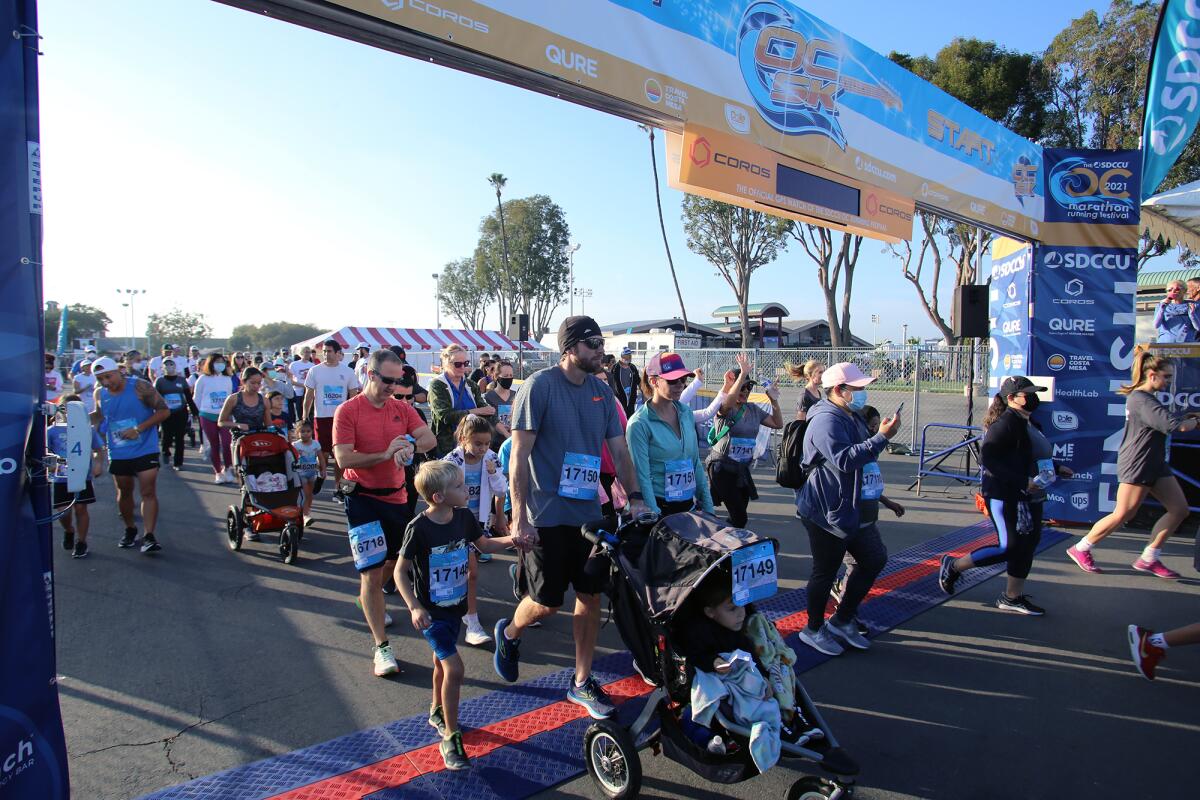 Families and walkers take part in the 2021 OC Marathon's 5K Run/Walk.