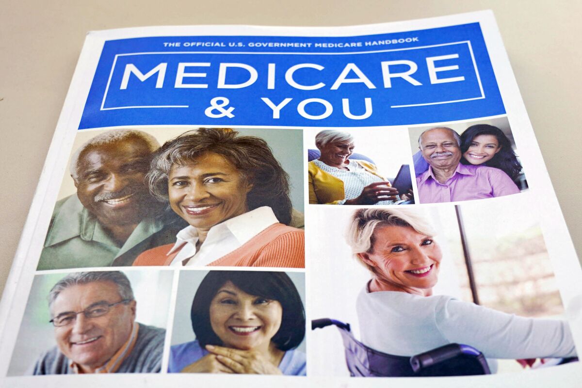 U.S. Medicare Handbook shows different people smiling in photos