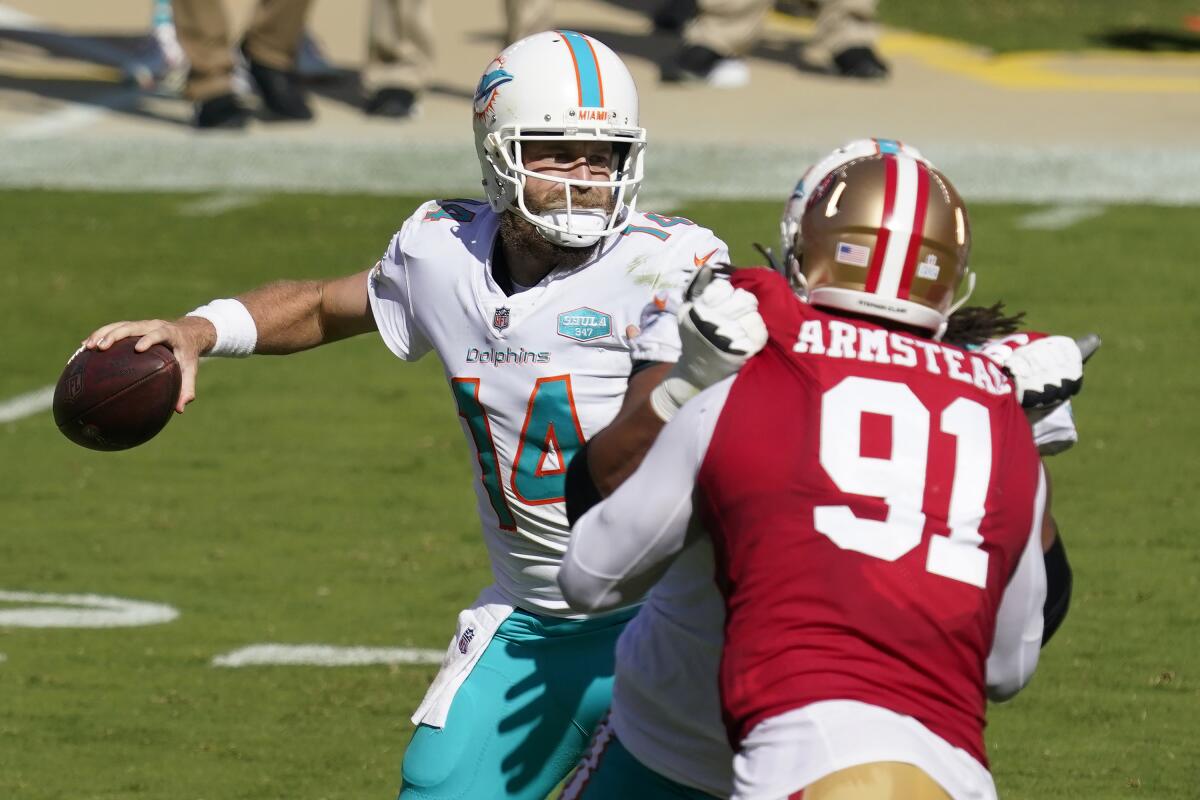 Miami Dolphins quarterback Ryan Fitzpatrick passes against the San Francisco 49ers on Sunday.