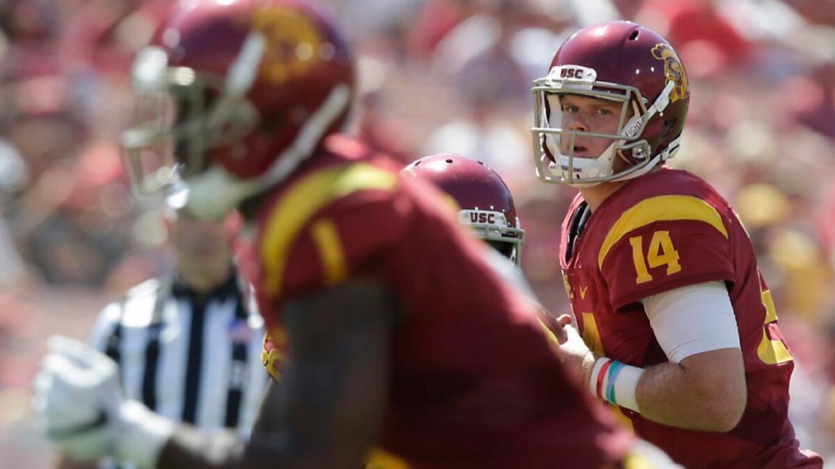 USC quarterback Sam Darnold gets set to throw a pass against Utah State during a game on Sept. 10.