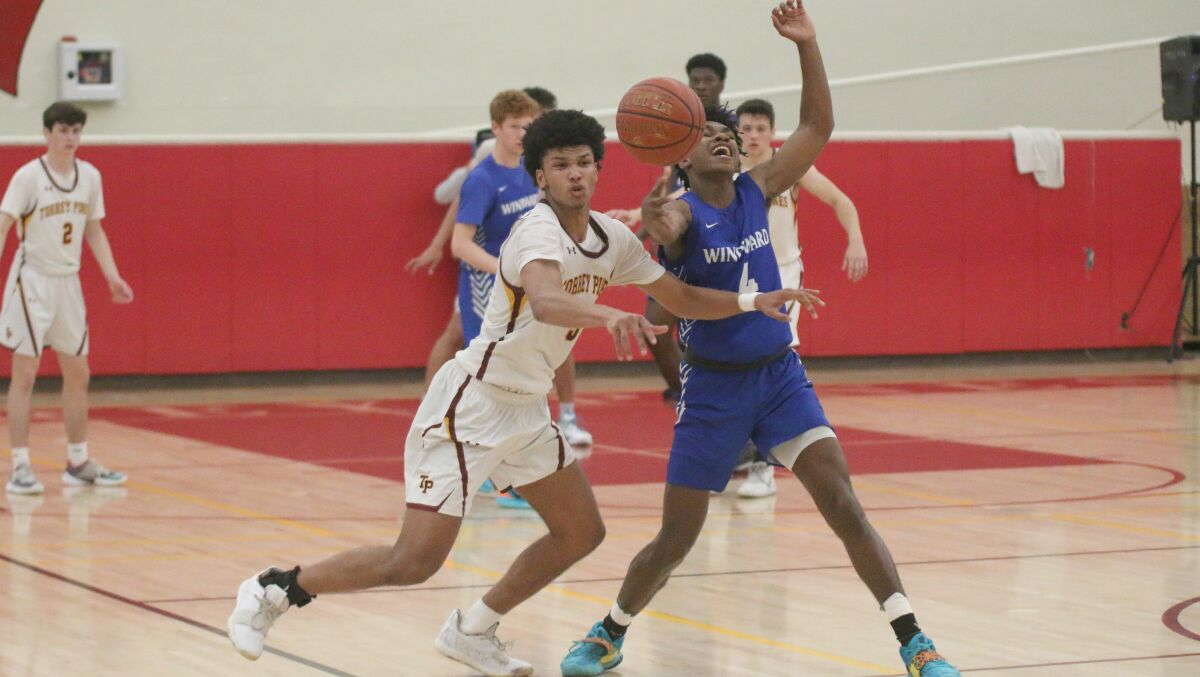 Junior Chris Howell steps in for a steal against Windward Thursday night.