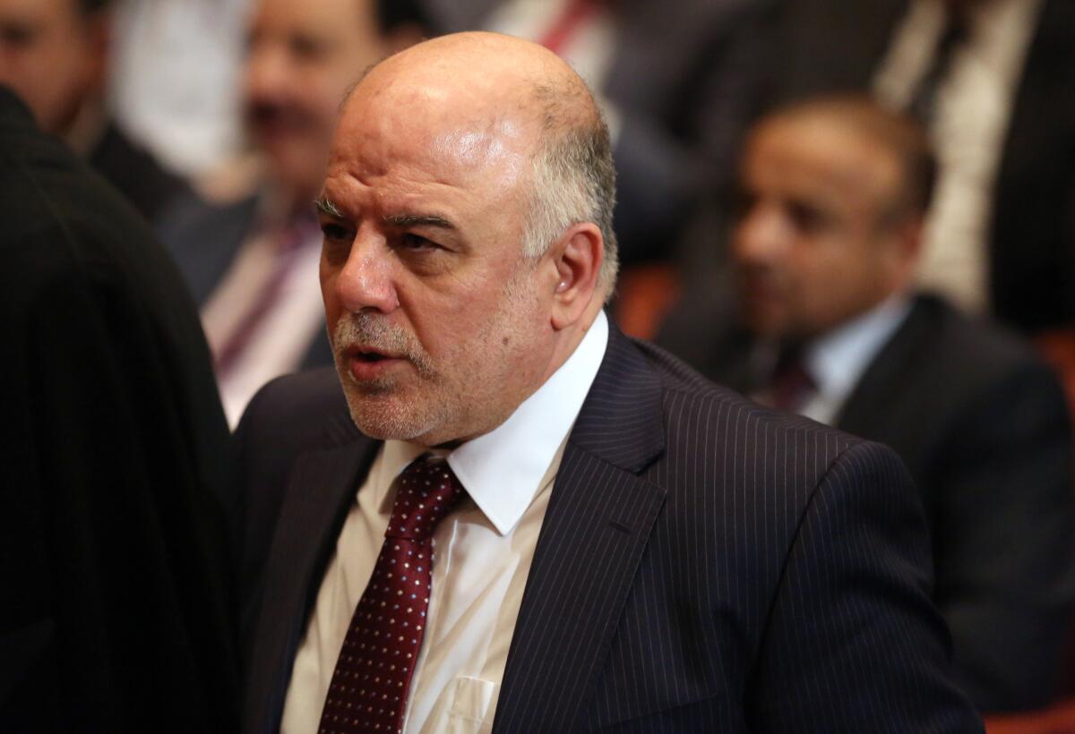 Iraq's new prime minister, Haider Abadi, shown attending a session of parliament on Sept. 8, has ordered his nation's air force to avoid airstrikes in areas the include civilians.