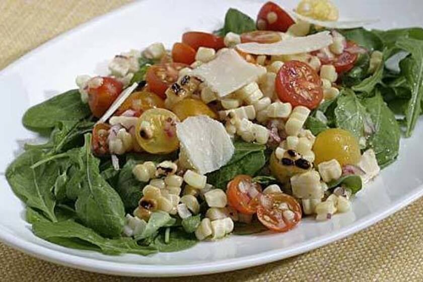 Recipe: Grilled corn and arugula salad.