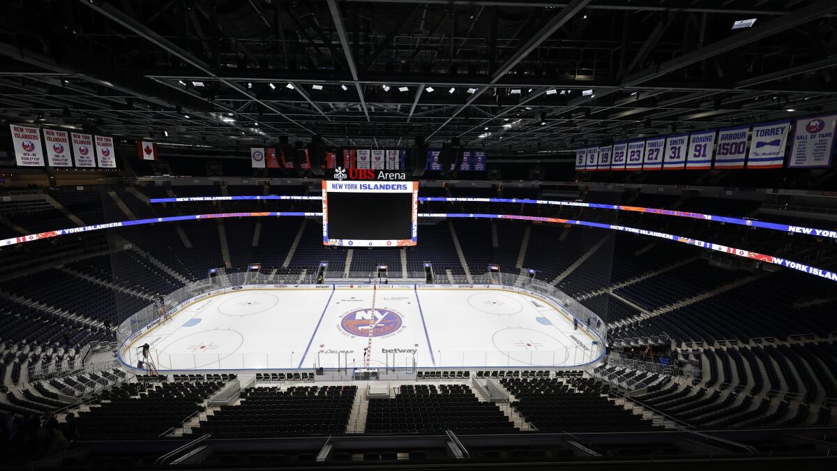 Flames spoil opening of Islanders' new arena