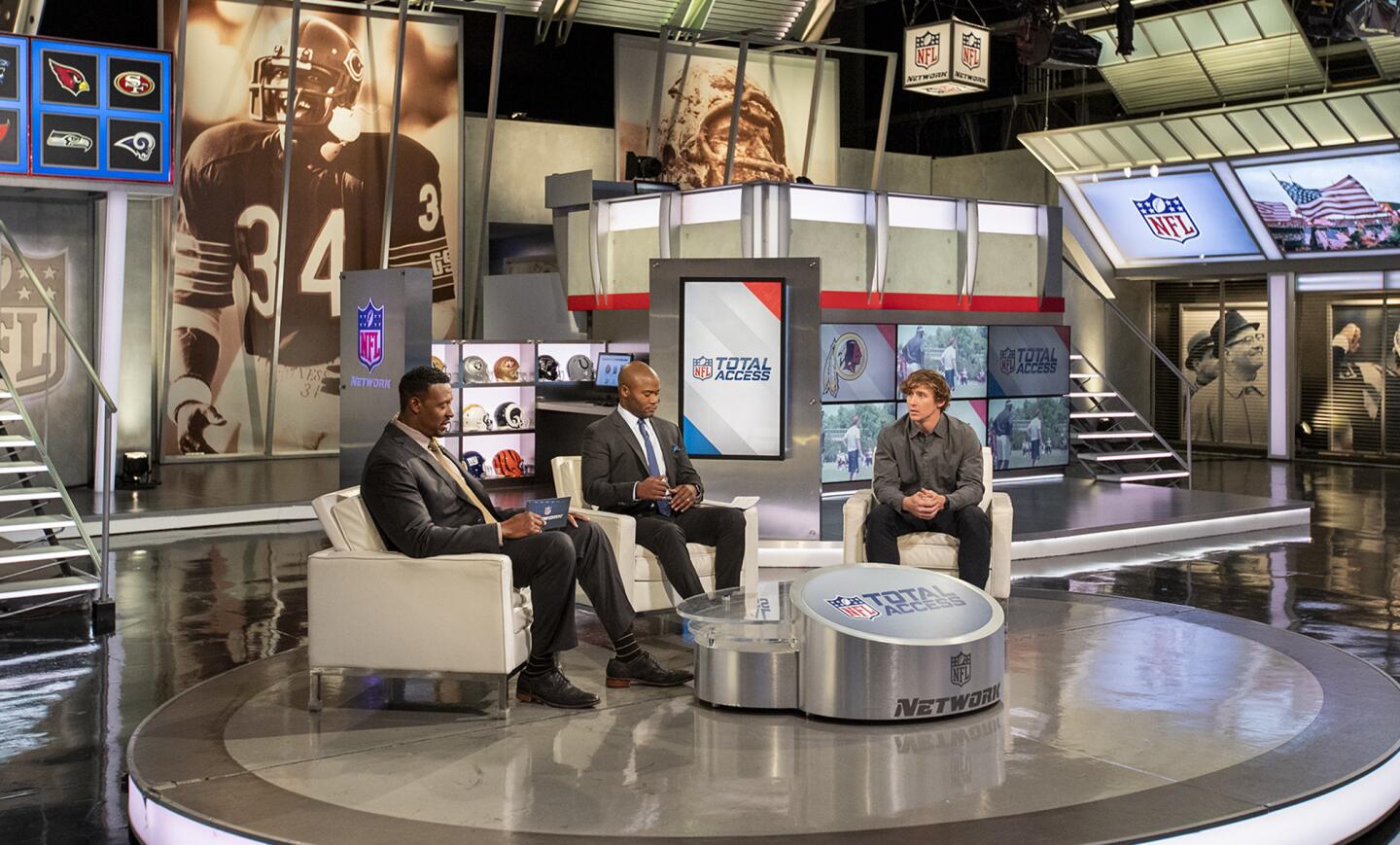 Photo Gallery: Mr. Irrelevant Trey Quinn conducts an interview at the NFL Network
