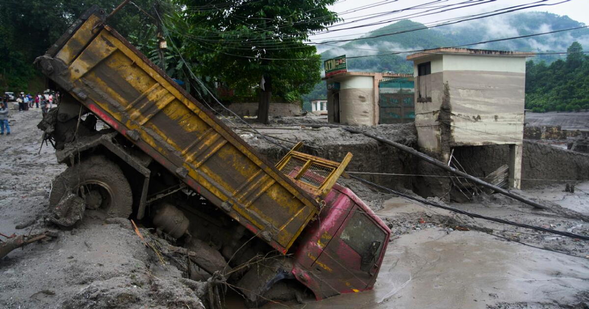 Photo: latimes.com A vehicle is seen in the aftermath of a flash floods in Devighat in the Nuwakot district in Nepal. Thursday, Aug 27, 2026