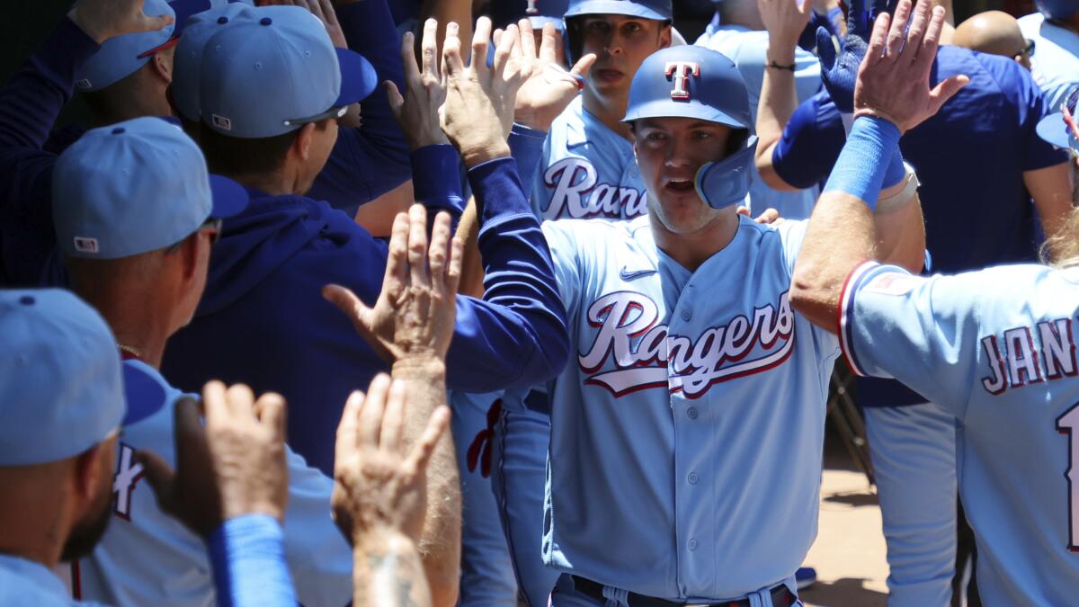 Jung's Grand Slam Sparks Rangers to Rout the Yankees