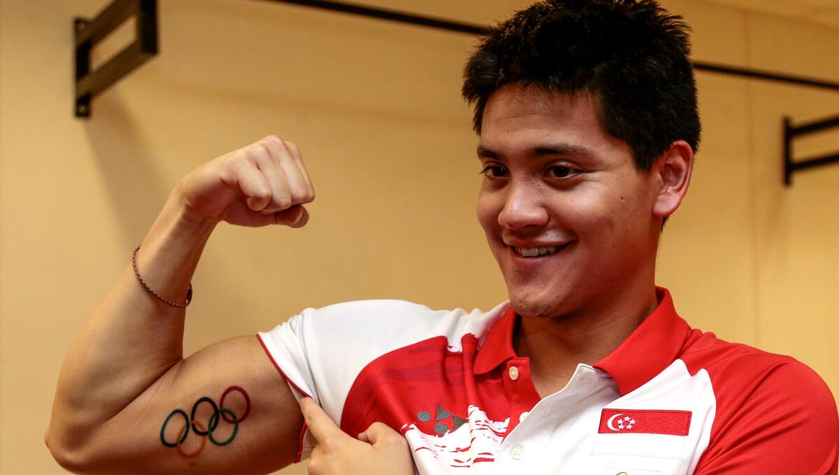 Joseph Schooling, sporting a fresh tattoo of the Olympic rings, is not only Singapore's only medalist in Rio. He's the only man to defeat Michael Phelps by winning the 100 butterfly.