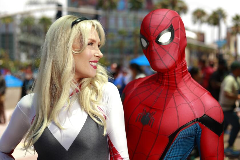 San Diego, CA - JULY 23: Cherish McConnell and husband Valor of San Diego dressed as Gwen Stacy Spider-Woman and Spiderman at Comic-Con in San Diego on Saturday, July 23, 2022. (K.C. Alfred / The San Diego Union-Tribune)