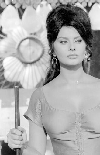 Sophia Loren stars in "La Riffa" ("The Raffle") the Vittorio de Sica-directed episode of the four-episode anthology film about love. Loren's husband was a producer on the film in which she played Zoe, a sexy shooting-gallery operator who is offered up as a prize to the best shooter.