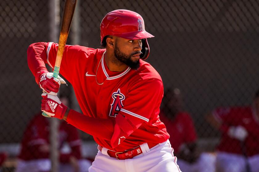 TEMPE, ARIZ. - FEBRUARY 18: Los Angeles Angels Jo Adell (59) at bat during live batting practice during Spring Training.
