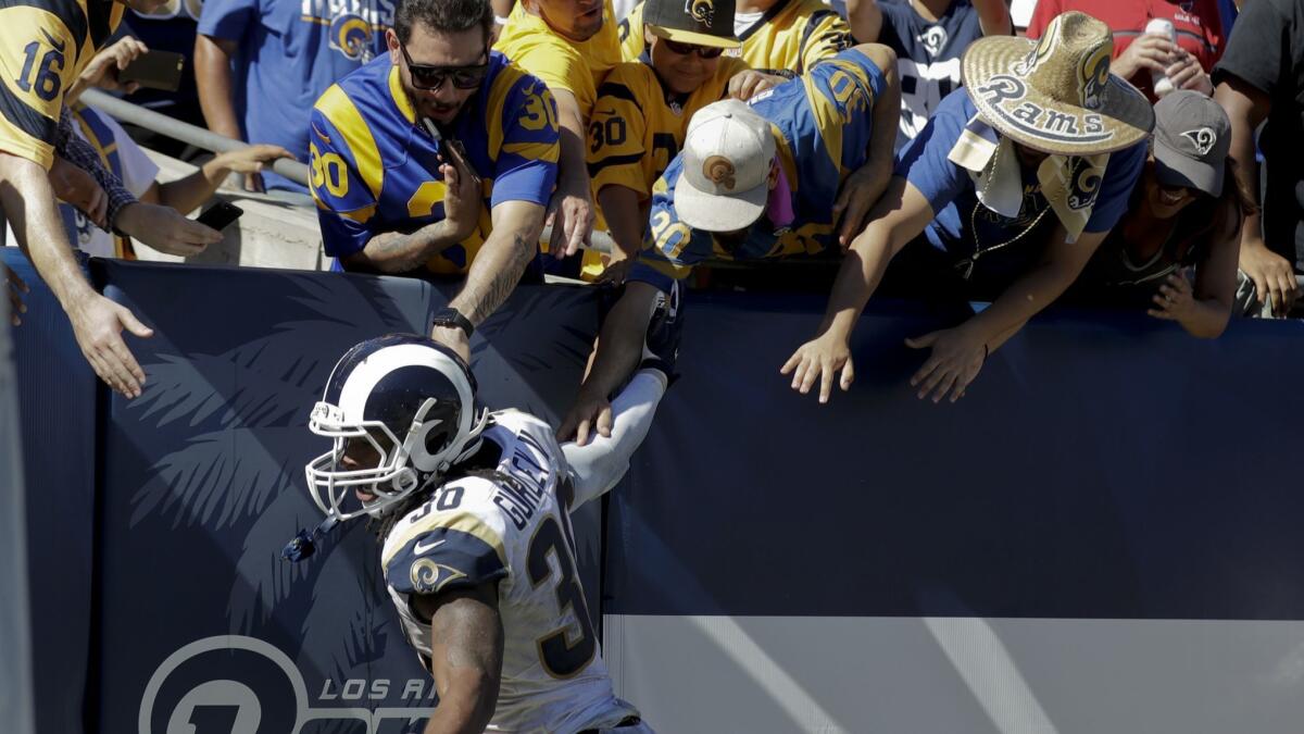 Los Angeles Rams running back Todd Gurley celebrates during the second half of 34-0 victory against the Arizona Cardinals on Sunday at the Coliseum.