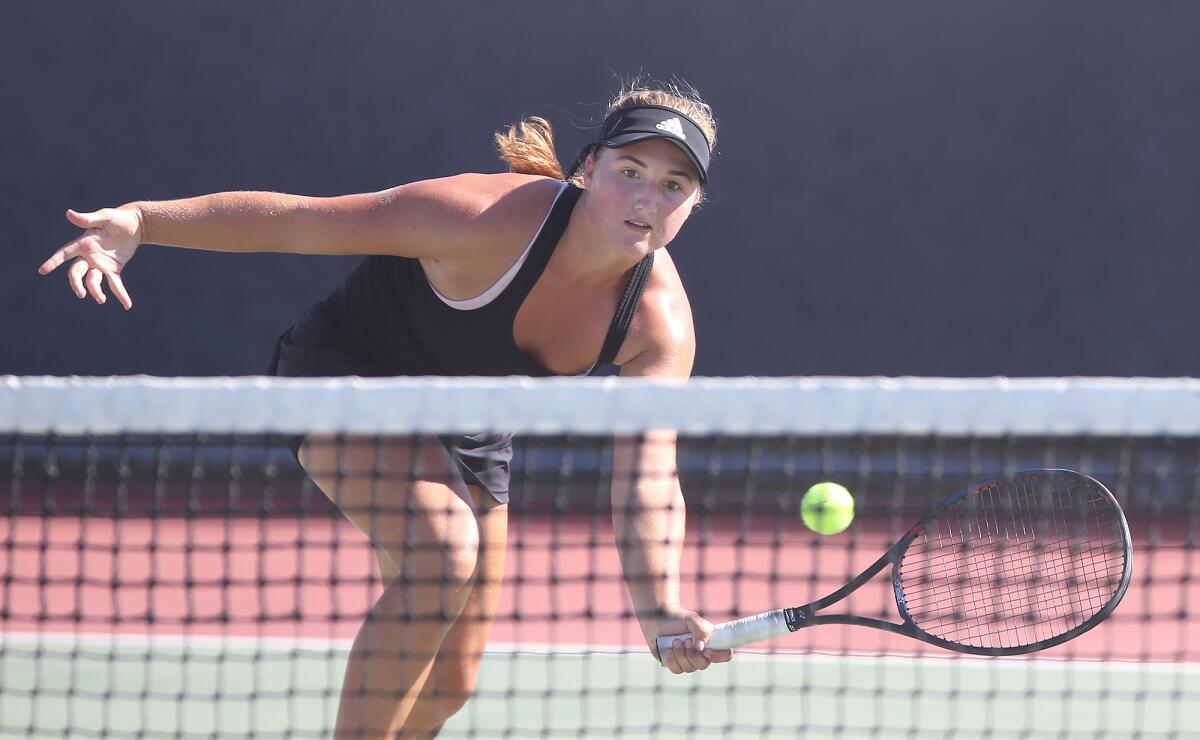 Huntington Beach's Kaytlin Taylor, seen in a Sept. 17 match against Woodbridge, won her CIF Southern Section Individuals tournament round of 32 singles match on Tuesday.