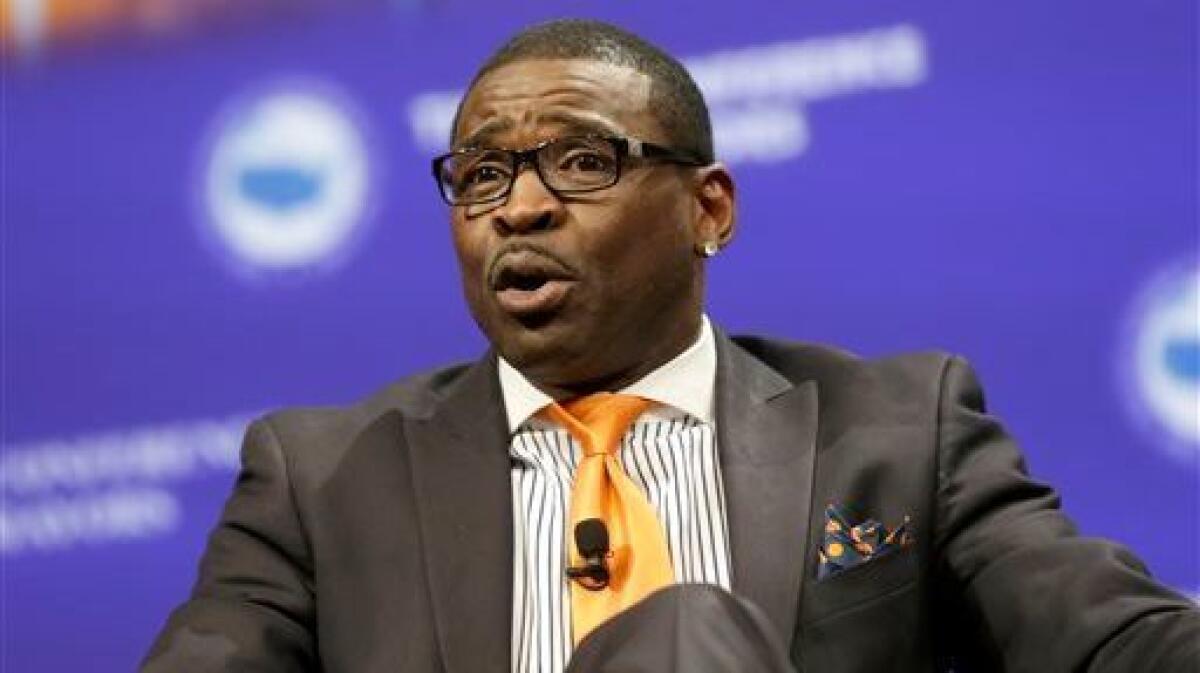 Michael Irvin speaks during a panel discussion on race and sports in Dallas on June 23, 2014.