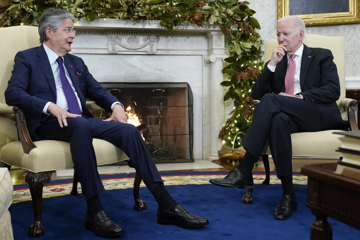 Ecuador's President Guillermo Lasso speaks with President Biden in the Oval Office 