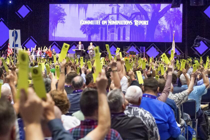 FILE - Delegates vote at the Southern Baptist Convention at the New Orleans Ernest N. Morial Convention Center in New Orleans, Tuesday, June 13, 2023. (Scott Clause/The Daily Advertiser via AP, File)