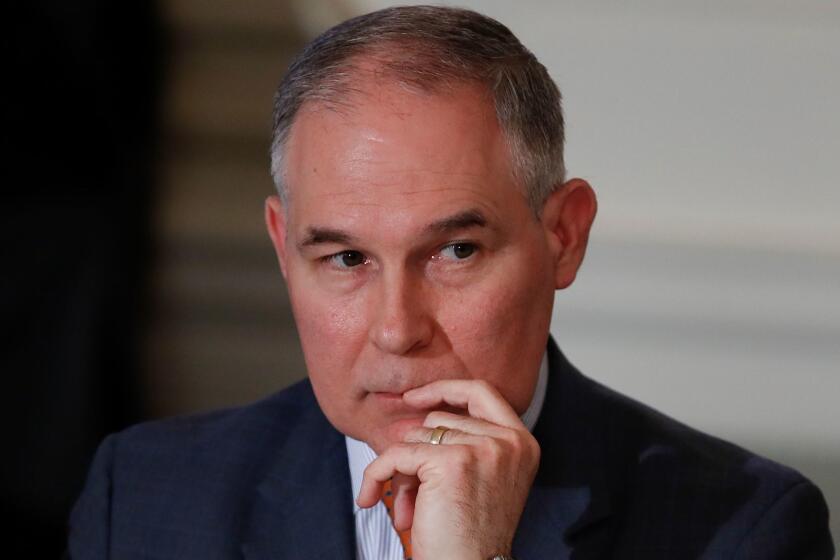 In this Feb. 12, 2018, photo, Environmental Protection Agency Administrator Scott Pruitt attends a meeting with state and local officials and President Donald Trump about infrastructure in the State Dining Room of the White House in Washington. Pruitt has broken months of silence about his frequent use of premium-class airfare at taxpayer expense, saying he needs to fly first class because of unpleasant interactions with other travelers. (AP Photo/Carolyn Kaster)