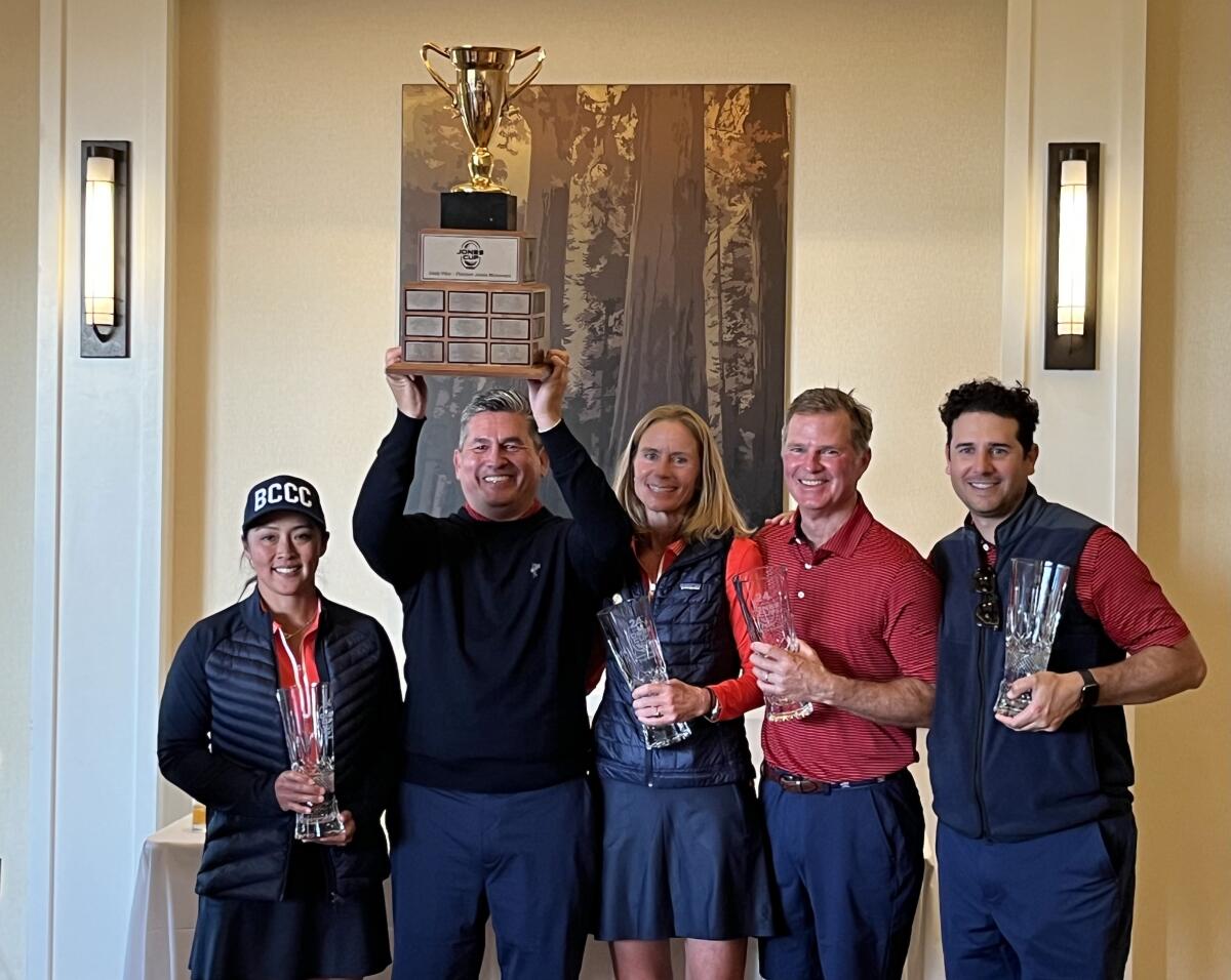 Big Canyon Country Club celebrates winning Wednesday's 24th annual Jones Cup community golf tournament.