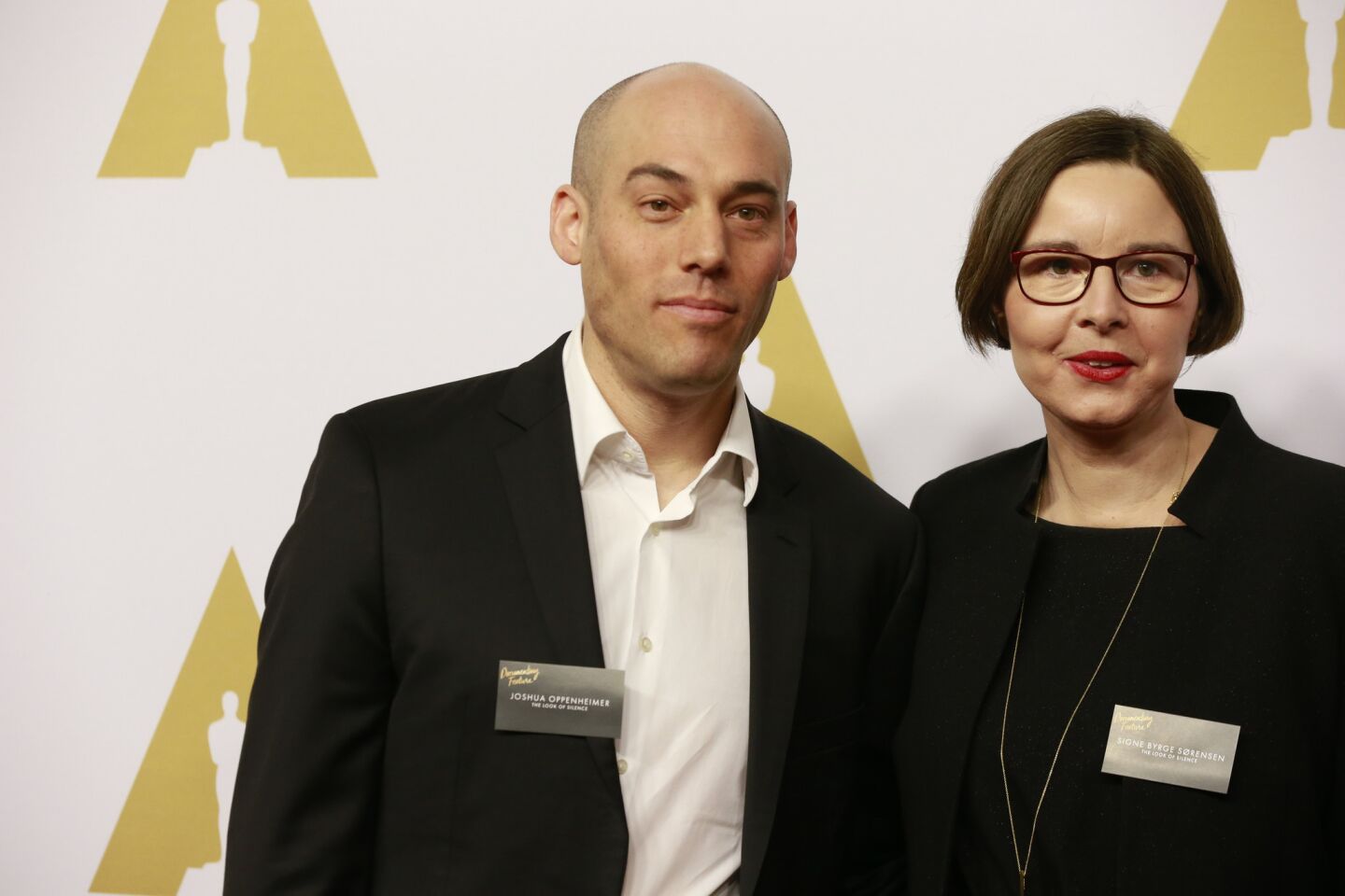 Joshua Oppenheimer and Signe Byrge Sorensen arrive for the 88th annual Academy Awards luncheon at the Beverly Hilton Hotel.
