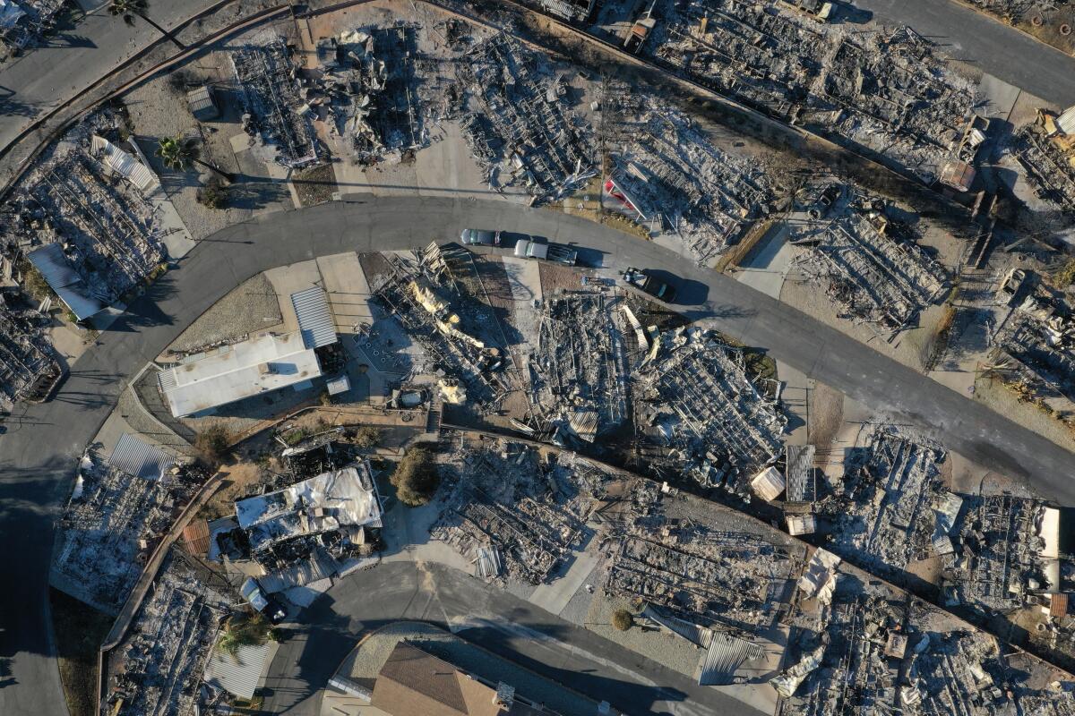 Burned-out mobile homes are seen in an aerial view after a fire in Riverside County.