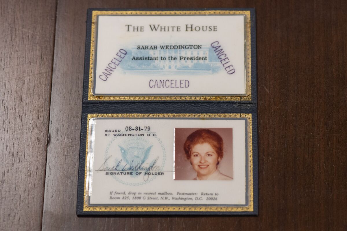 This February 2022 photo provided by Texas Woman's University shows the White House ID of the late Texas lawyer Sarah Weddington from her time working during the Carter Administration photographed at the Blagg Huey Library on the Denton campus of Texas Woman's University. Papers, pictures and other artifacts belonging to Weddington will become part of Texas Woman's University's permanent collection the university announced Tuesday, March 8, 2022. At the age of 26, Weddington successfully argued the landmark abortion rights case Roe v. Wade before the U.S. Supreme Court. (Michael Modecki/Texas Woman's University via AP)