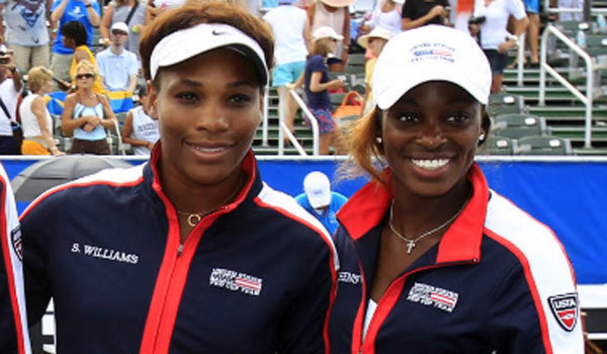 Serena Williams, left, and Sloane Stephens stand side by side in a U.S. Fed Cup team photo in April.