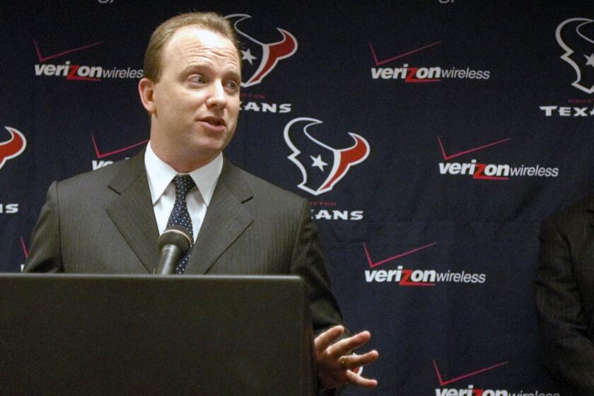 FILE - In this Nov. 24, 2003, file photo, Will Wilson, then-marketing director for NFL Mexico, speaks at a press conference in Houston. Wilson, the head of the NFL division of the Wasserman Media Group and the uncle of former Indianapolis quarterback Andrew Luck, was hired Monday, March 23, 2020, as chief executive officer of the troubled U.S. Soccer Federation. (AP Photo/Pat Sullivan, File)