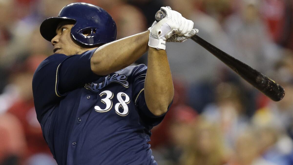Milwaukee's Wily Peralta hits a two-run double against the Cincinnati Reds during the Brewers' 2-0 win Friday. The Brewers have fallen from No. 1 to No. 2 in this week's MLB rankings.