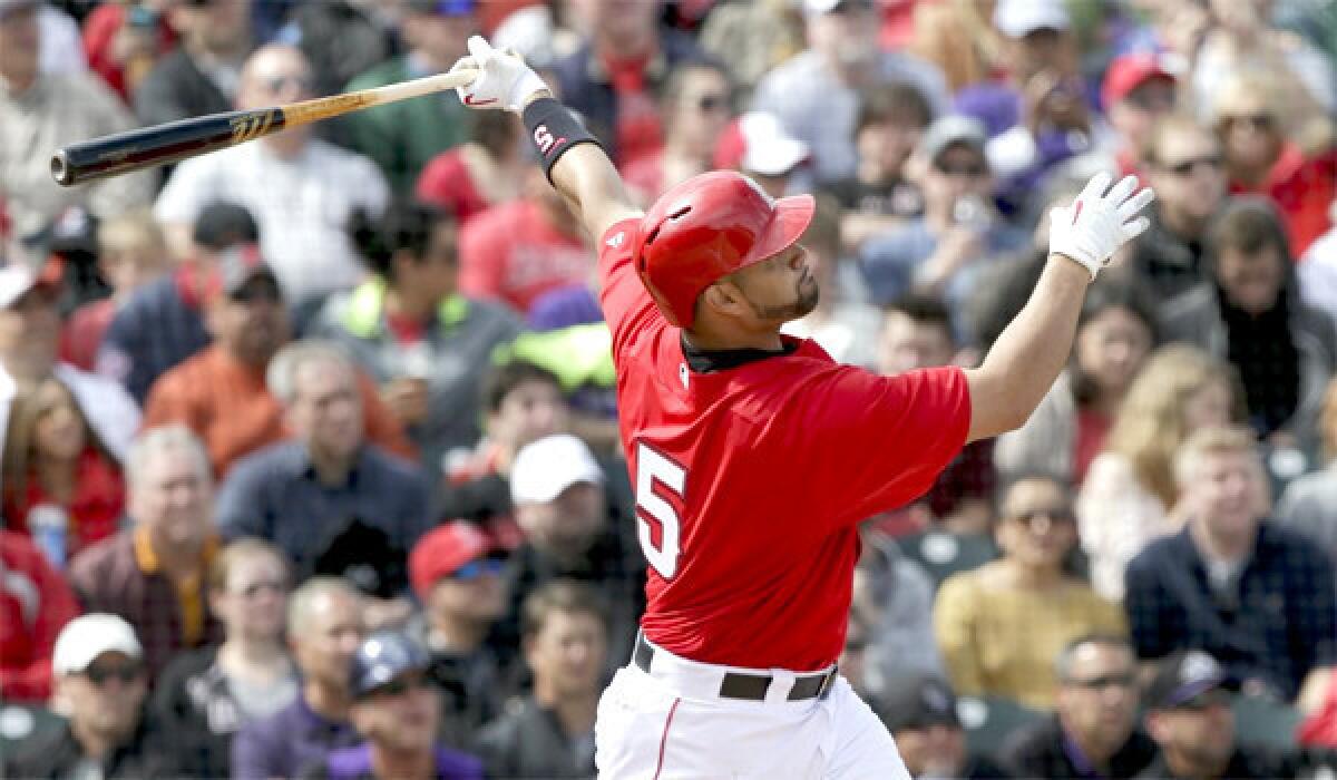 Albert Pujols saw his first action on defense for the Angels in spring training in a 6-1 loss to the Milwaukee Brewers.