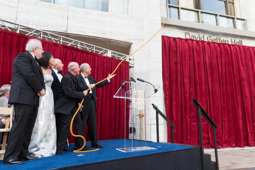 Pianist Emanuel Ax, left, Lincoln Center Chair Katherine Farley, New York Philharmonic Chair Oscar Schafer, David Geffen and Lincoln Center President Jed Bernstein take part in the renaming ceremony for David Geffen Hall on Sept 24.