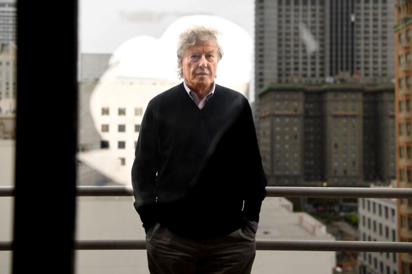 Tom Stoppard shooting through a window in San Francisco.