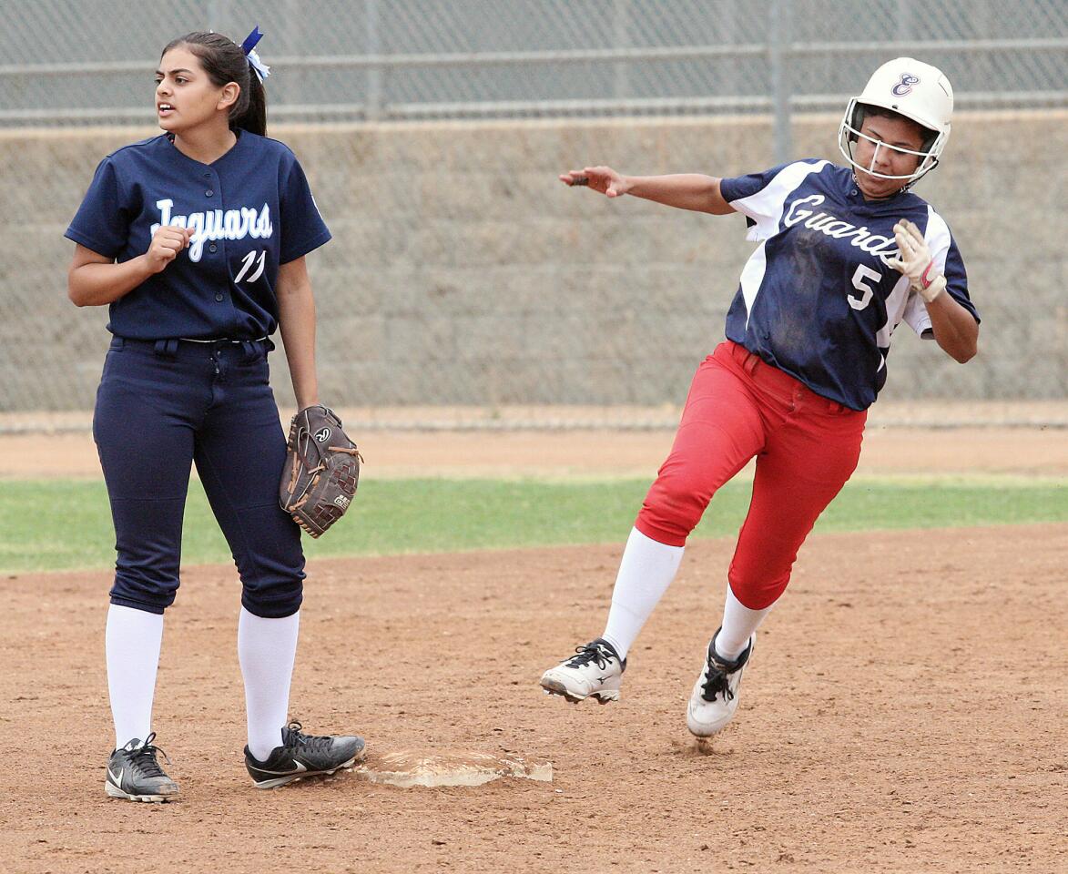 Bell Jeff's Tiffany Galindo passes second base after hitting a home run while Alverno's Emily Zepeda waits for the throw during a second round CIF playoff game at the Glendale Sports Complex on Thursday, May 22, 2014.