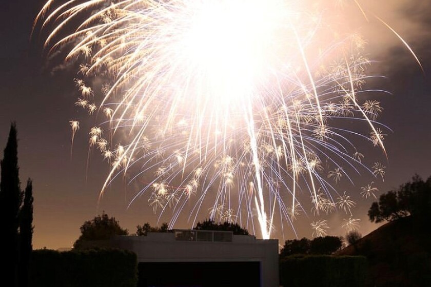Fireworks shoot out over the Starlight Bowl amphitheater