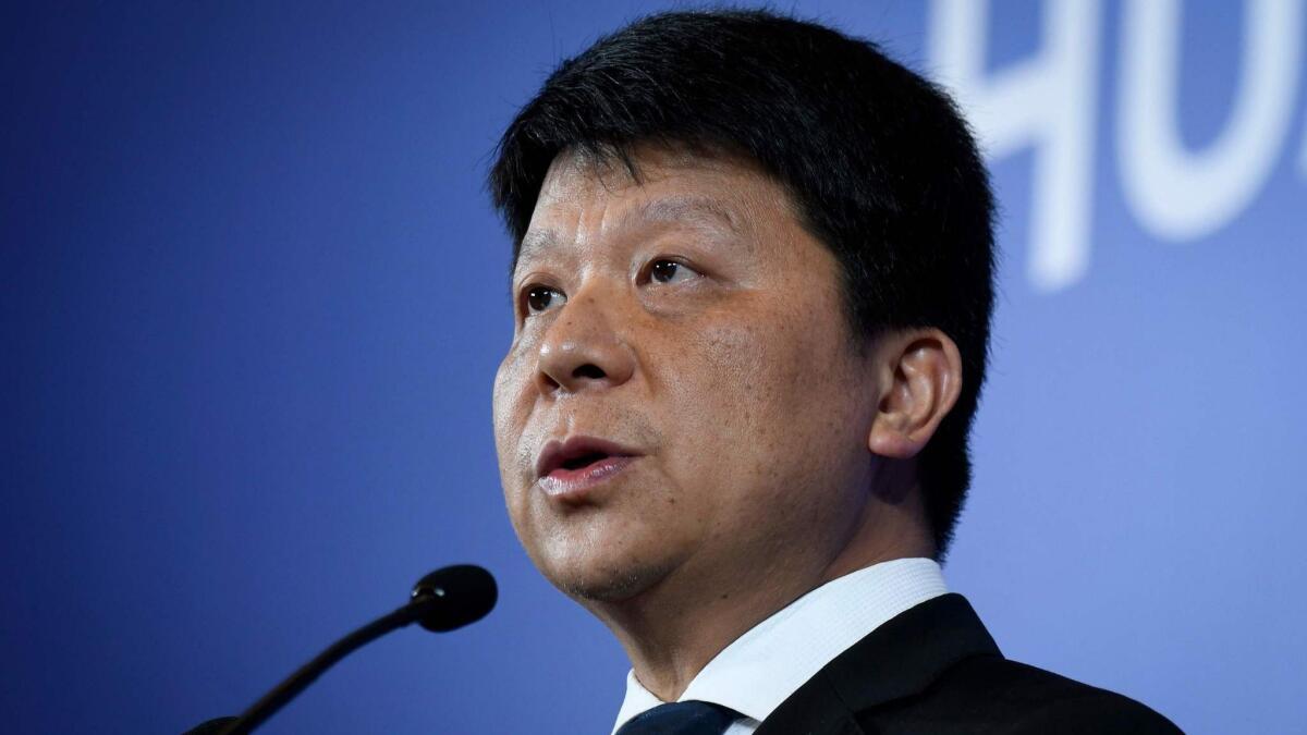 Huawei executive Guo Ping speaks at a news conference in Shenzhen, China, on Thursday.