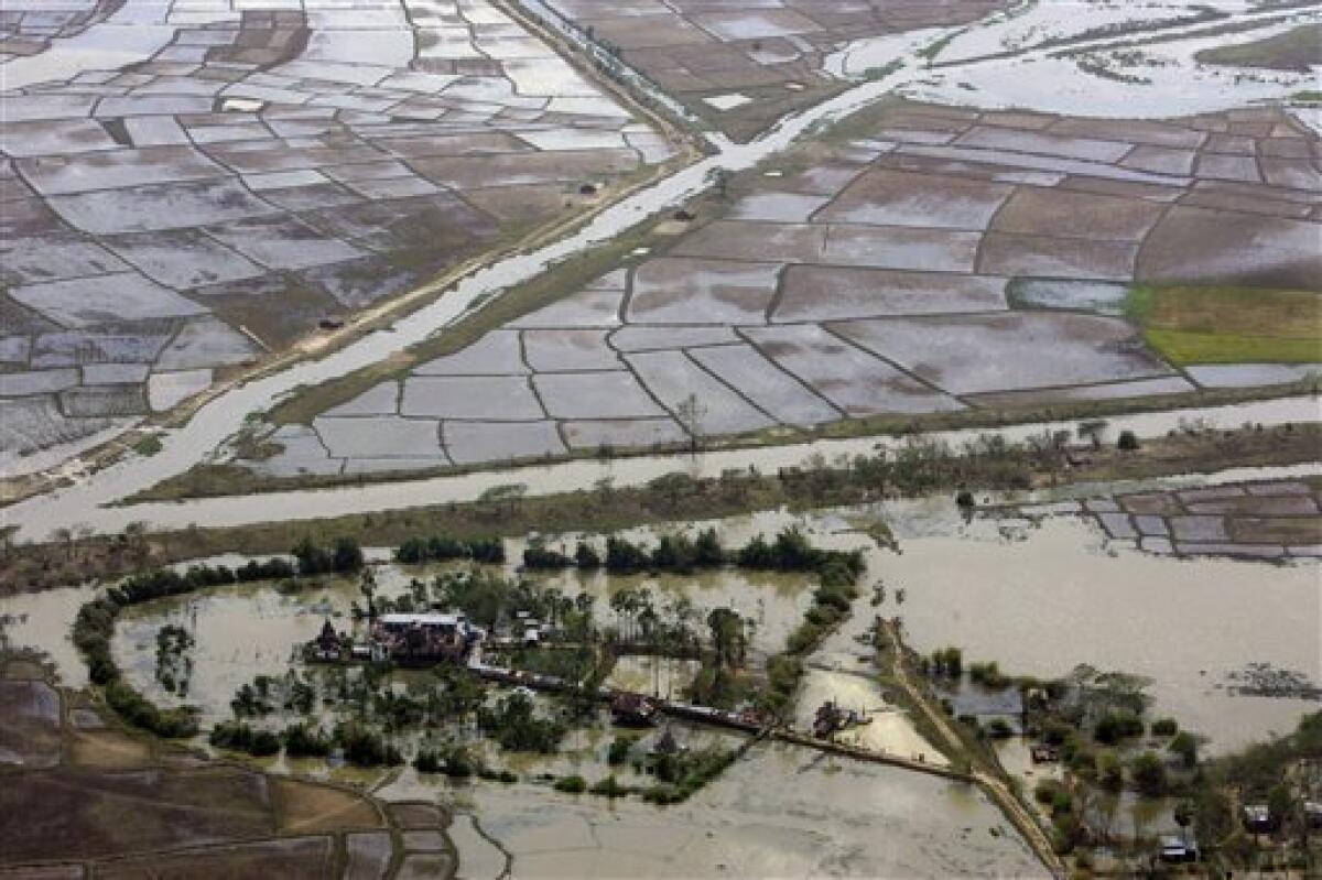 FILE - In this May 6, 2008, file photo an aerial view of devastation caused by the cyclone Nargis is seen at an unknown location in Myanmar. Without hundreds of millions of dollars more in assistance, many victims of last year's cyclone in Myanmar will not have the money to rebuild their homes or replant their flood fields in the country's Irrawaddy delta, the British charity Oxfam said. (AP Photo/File)
