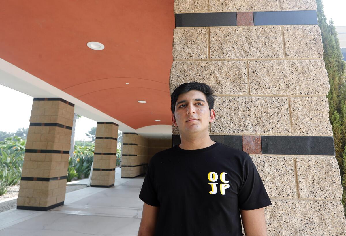 Arush Mehrotra stands at the Irvine Civic Center. 