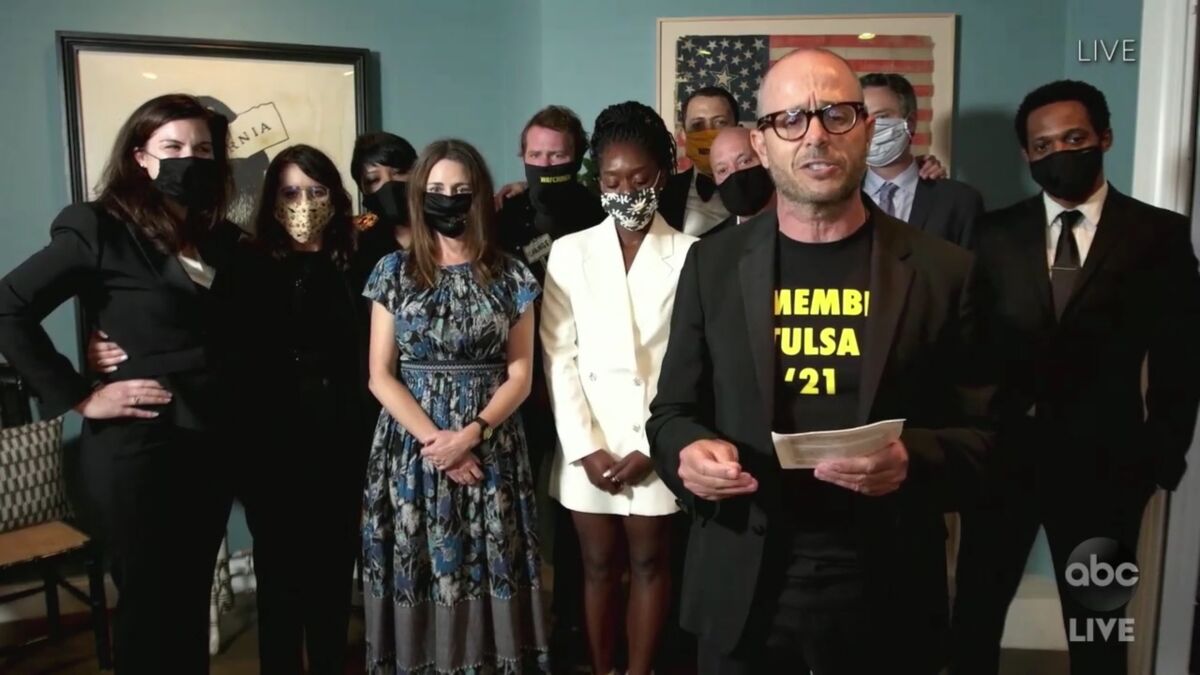 Damon Lindelof with the cast of "Watchmen" after winning an Emmy for limited series.