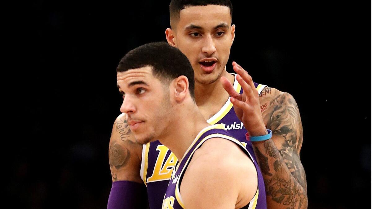 Lonzo Ball, front, and Kyle Kuzma