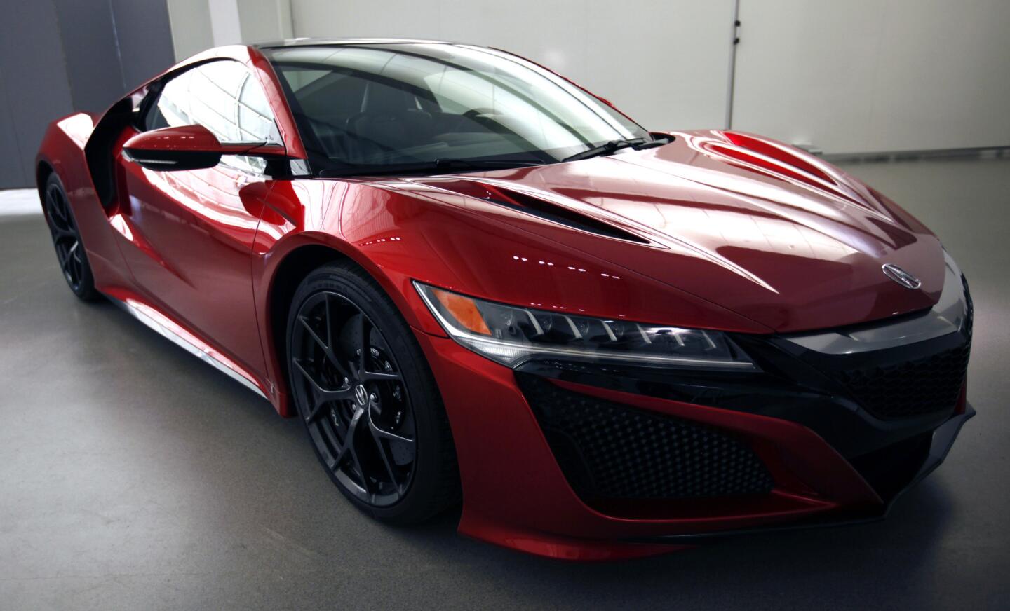 The all-new 2016 Acura NSX has a twin-turbocharged V-6 and three electric motors for a total of 550 horsepower.